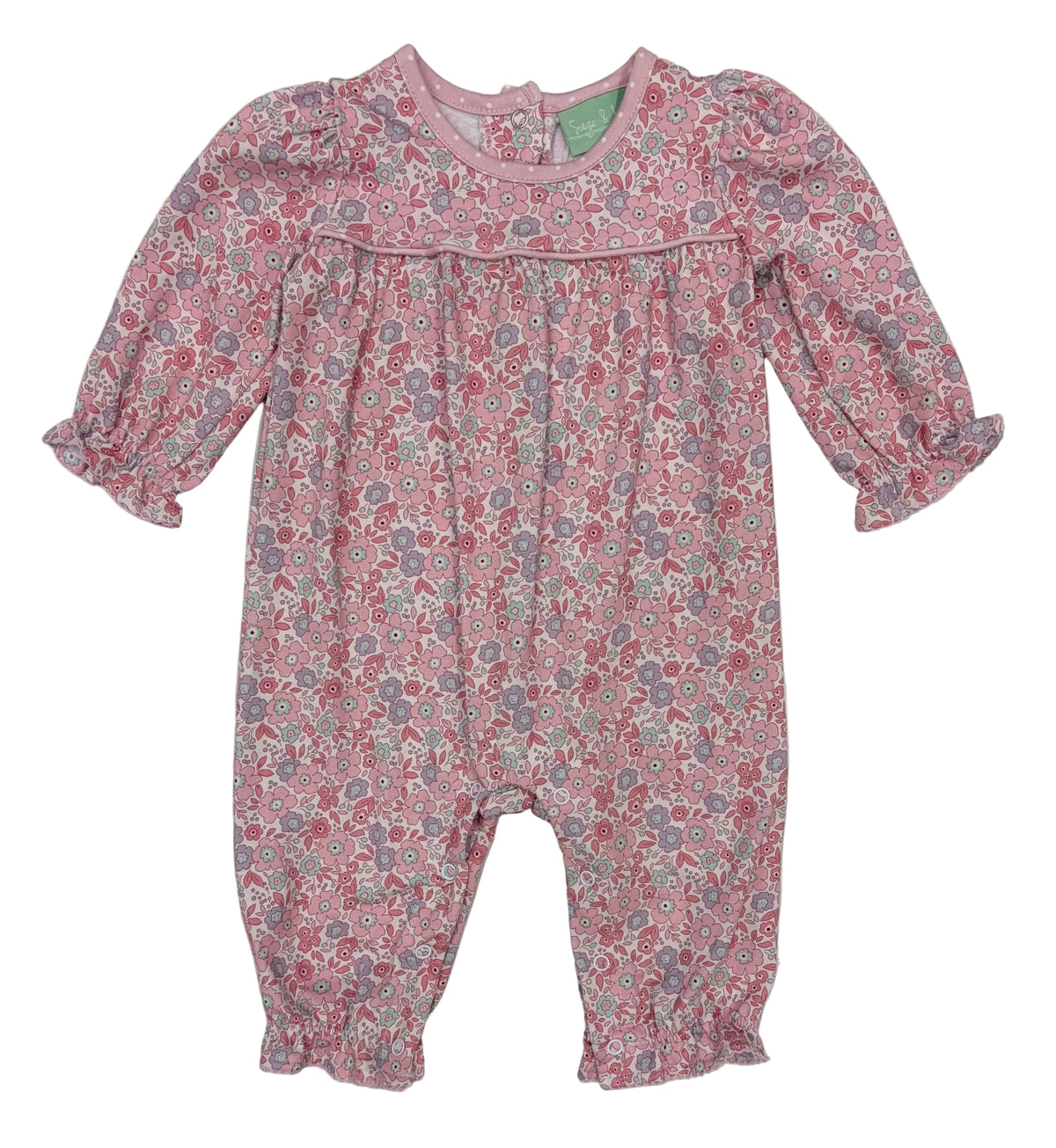 A baby girl's long-sleeve romper in a pink, red, and gray floral print, featuring a smocked chest and ruffled cuffs and leg hems, laid flat on a light gray background.